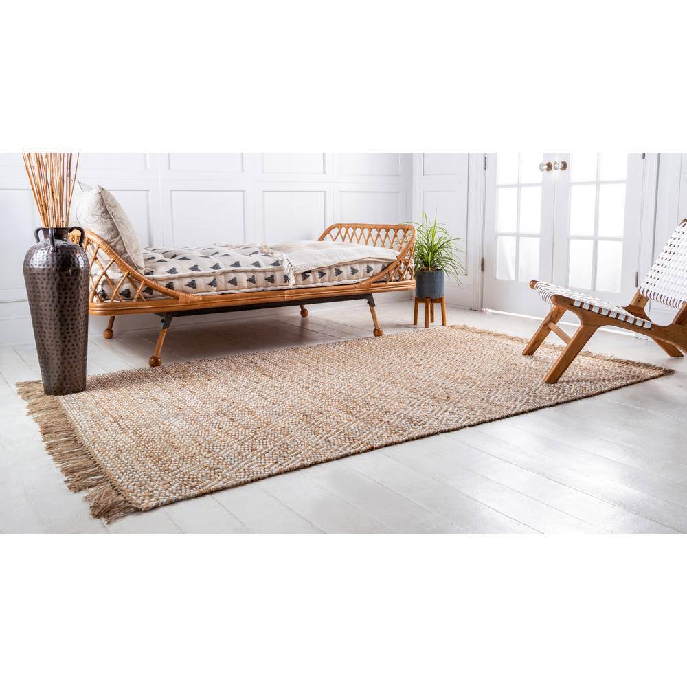 Handmade Braided Jute and Cotton 3' 3" x 5' 1" Area Rug in Natural Brown