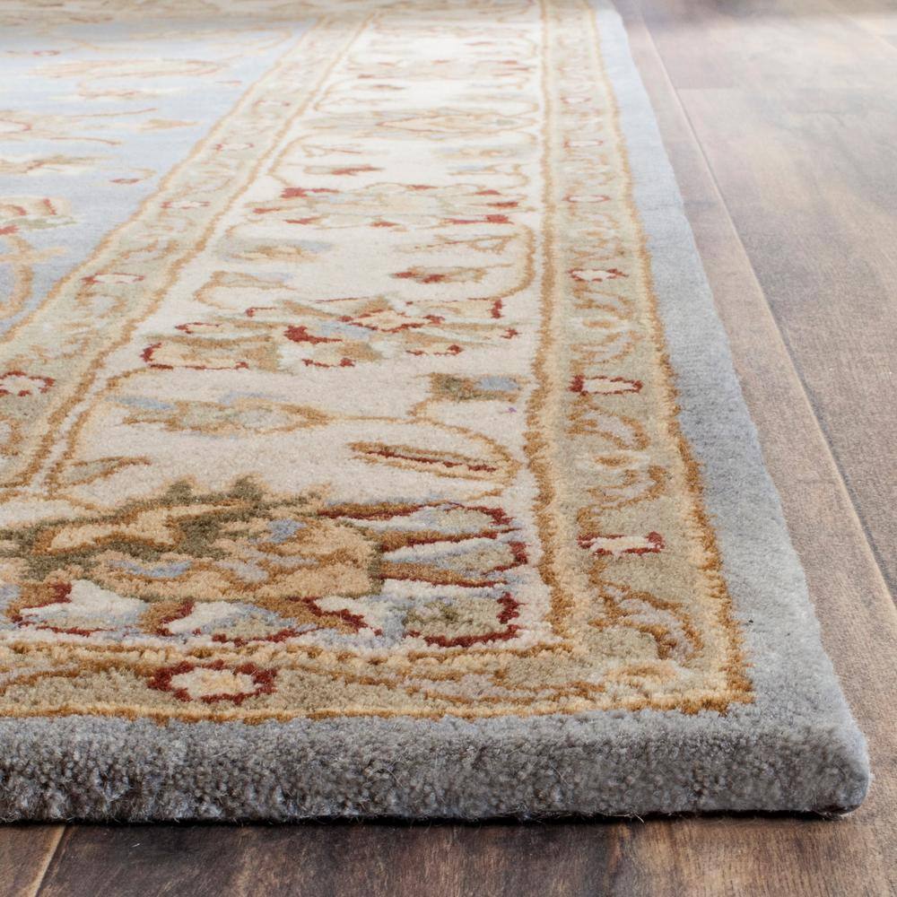 Handmade Blue and Beige Wool Tufted 5' x 7' Area Rug