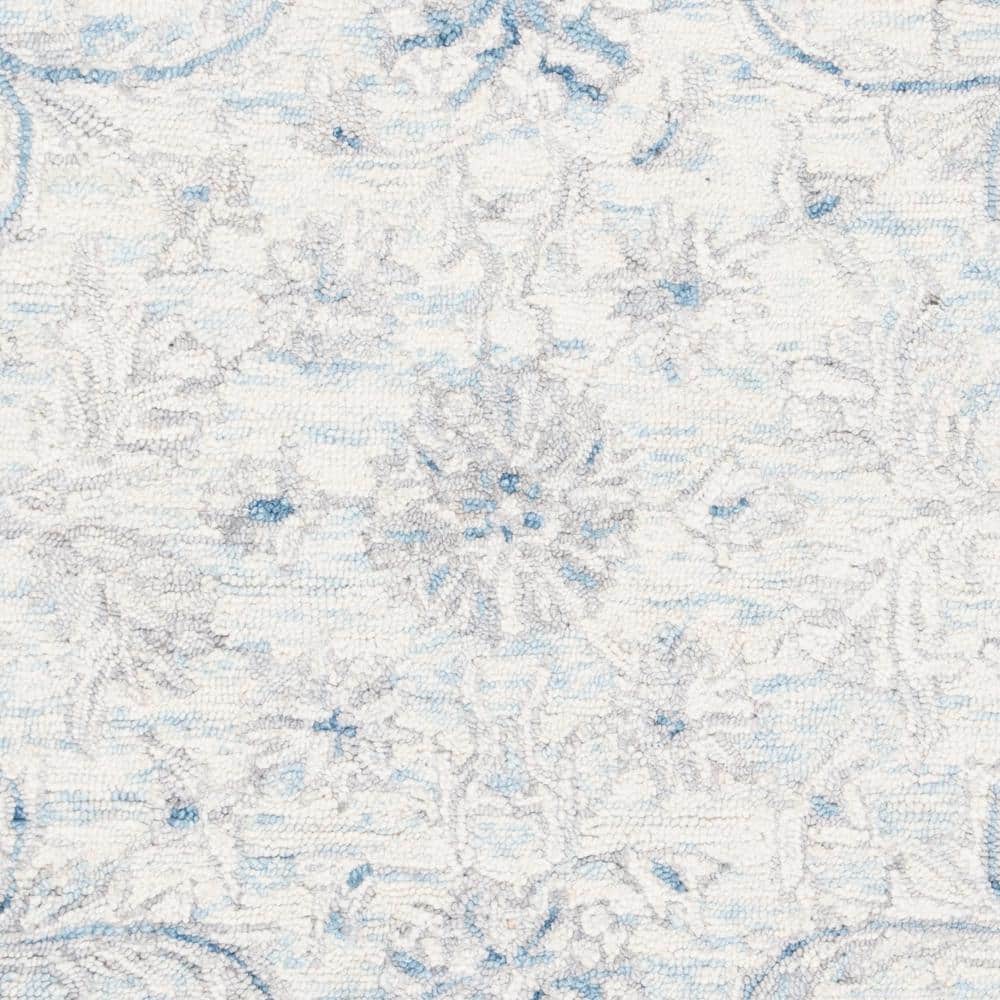 Elysian Bliss Light Blue/Ivory Hand-Tufted Wool Round Rug