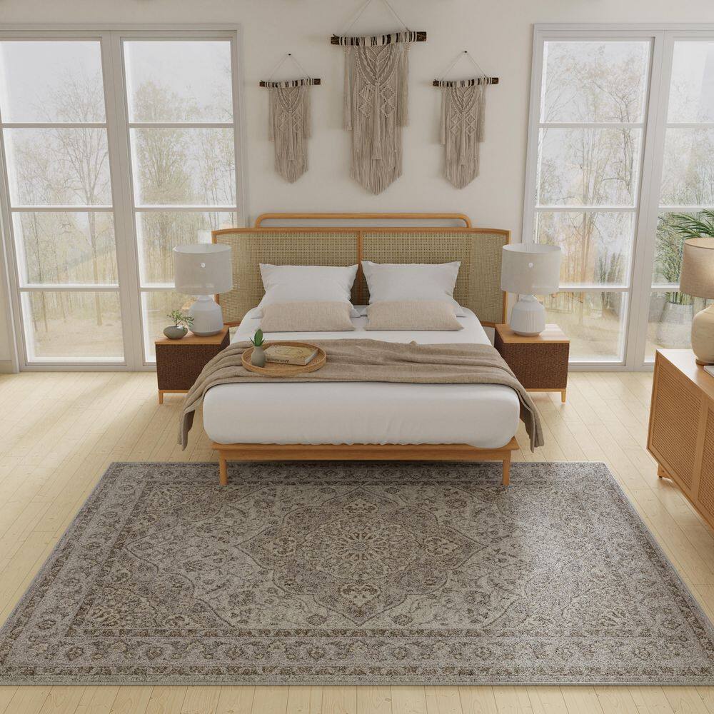 Gray and Beige 4' x 6' Oriental Synthetic Area Rug