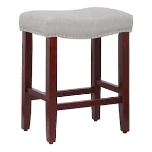 Jameson 24 in. Counter Height Cherry Wood Backless Nailhead Trim Barstool with Upholstered Gray Linen Saddle Seat