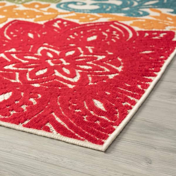 https://images.thdstatic.com/productImages/da4c62d2-5755-5b43-9699-149ac42bbc66/svn/multi-color-tayse-rugs-outdoor-rugs-oas1301-9x12-c3_600.jpg