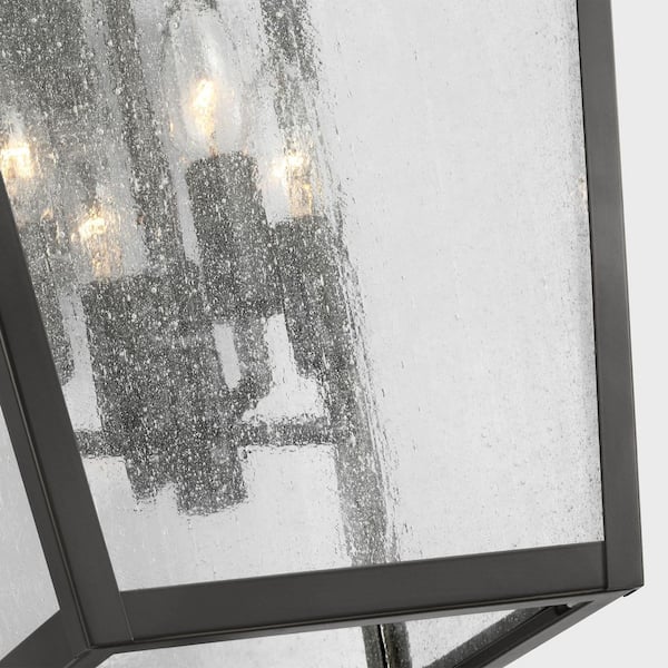 SCOTT LIVING - Kennewick 12.5 in. W x 19 in. H 4-Light Antique Bronze Outdoor Wall Lantern with Distressed Seeded Glass Shade