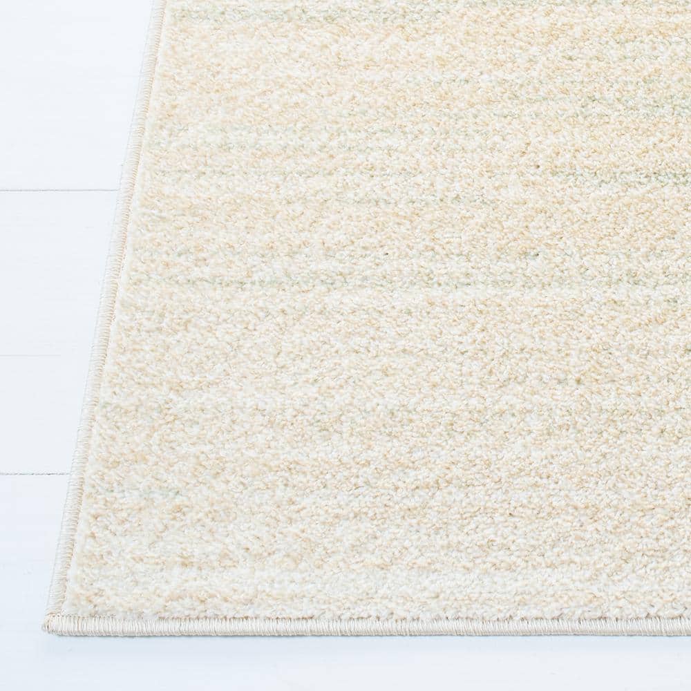 Green and Ivory Rectangular 9' x 12' Stain-Resistant Synthetic Rug