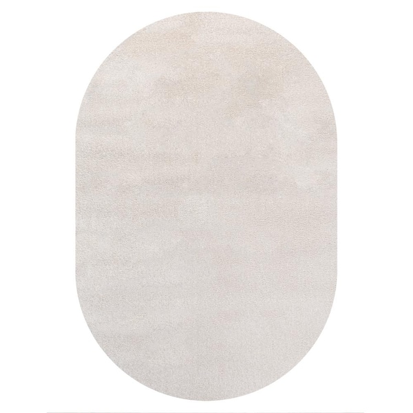 Haze Solid Low-Pile Ivory 5 ft. x 8 ft. Oval Area Rug