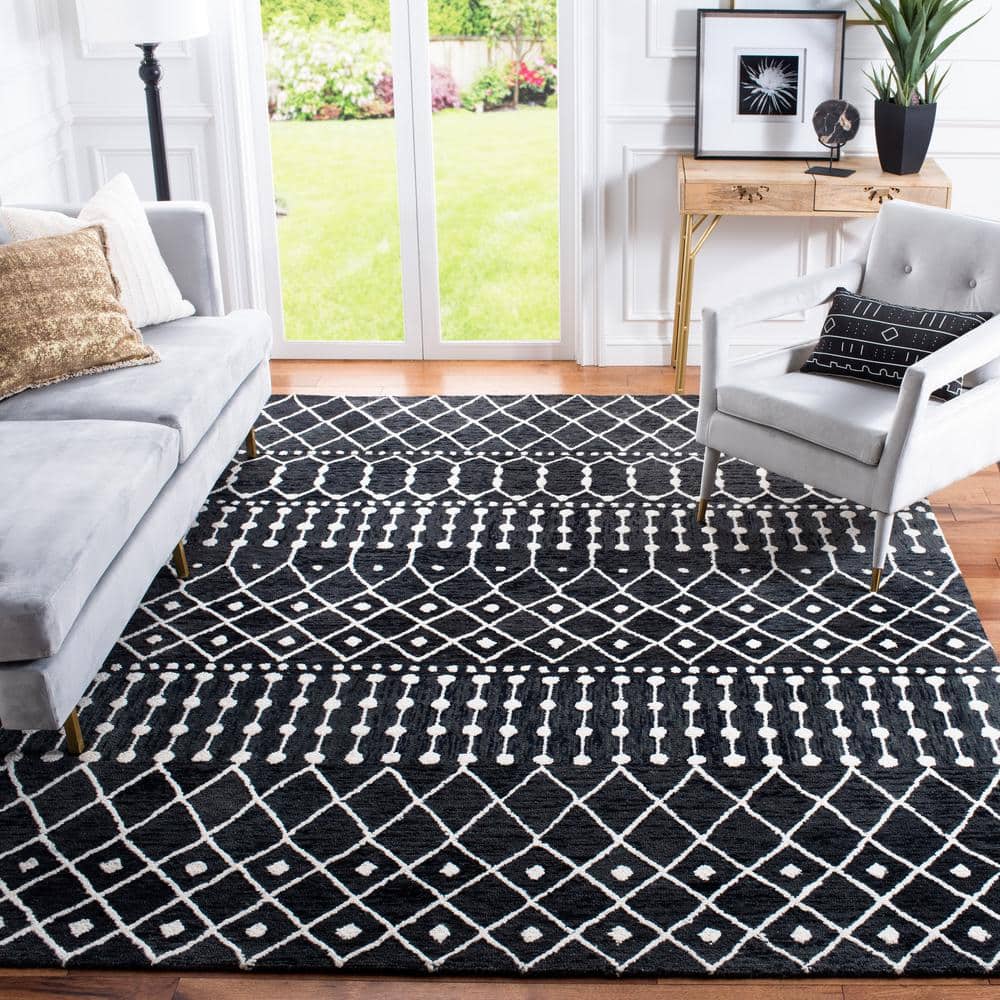 Black and Ivory 8' x 10' Handmade Wool Tufted Area Rug