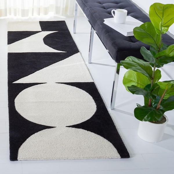 Rodeo Drive 2 ft. x 10 ft. Ivory/Black Abstract Geometric Runner Rug