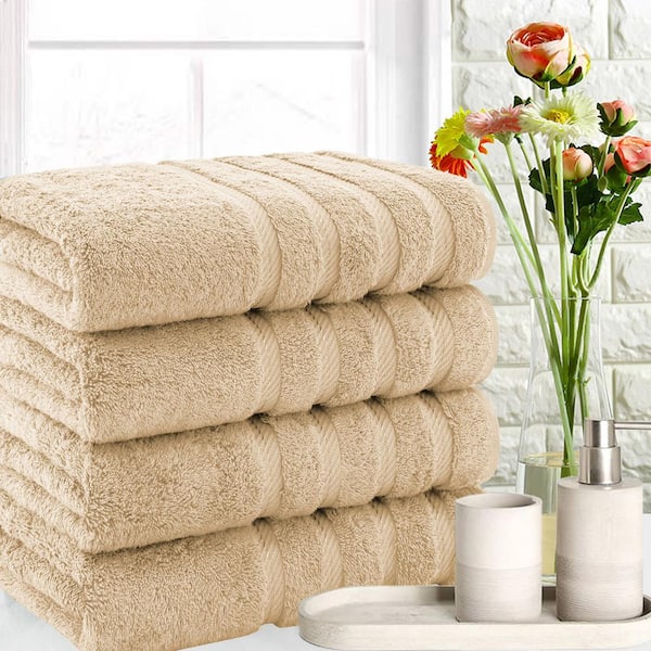 https://images.thdstatic.com/productImages/da80bd0b-8a26-44f0-b694-0a2a9497cd97/svn/sand-taupe-american-soft-linen-bath-towels-edis4bathtaue125-31_600.jpg