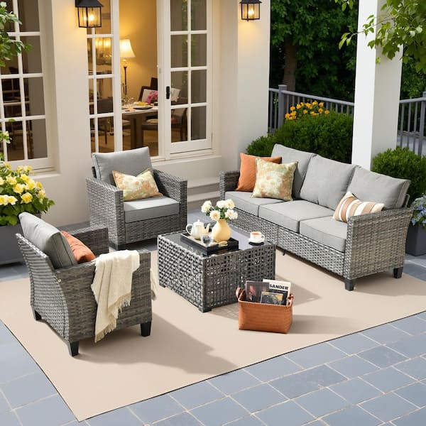 Scarlet 4-Piece Wicker Outdoor Furniture Patio Conversation Sofa Set with a Solar Lighted Table and Dark Grey Cushions