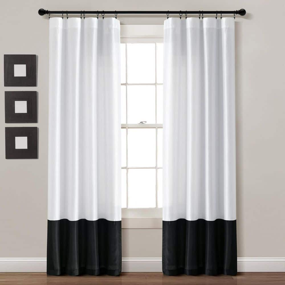 https://images.thdstatic.com/productImages/da922666-70d2-439f-8db0-772452e893e4/svn/white-black-light-filtering-curtains-21t012471-64_1000.jpg