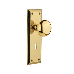 NY doorknob and back plate passage set solid brass lacquered brass 
