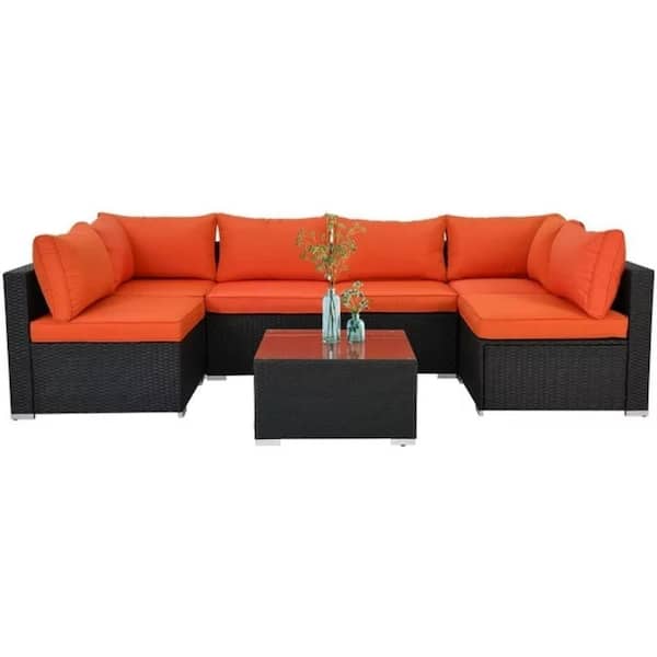ESSENTIAL LOUNGER 7-Piece Wicker Patio Conversation Set with Orange Cushions