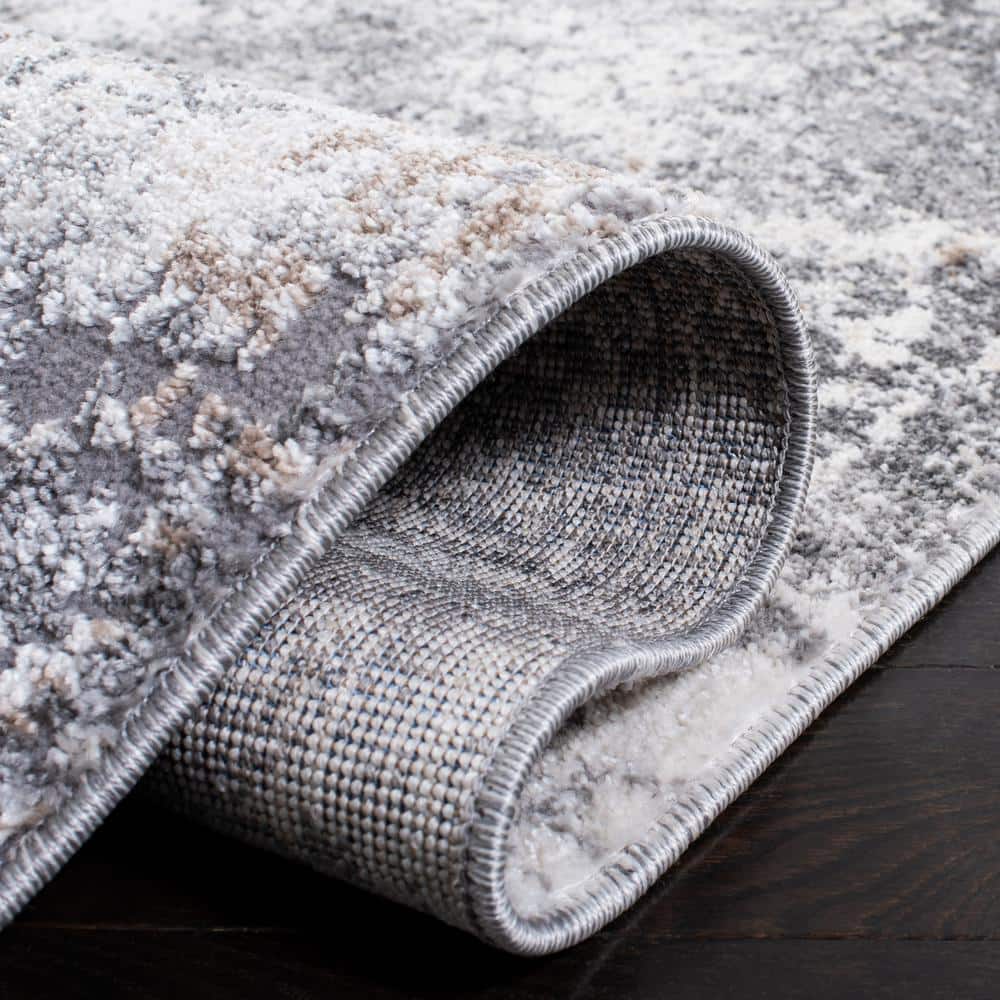 Aston Ivory and Gray Abstract Synthetic Area Rug 3' x 5'