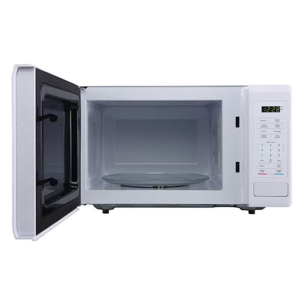 https://images.thdstatic.com/productImages/daec09ac-a548-4cd9-9135-24fa2d070d78/svn/white-magic-chef-countertop-microwaves-mc99mw-e1_600.jpg