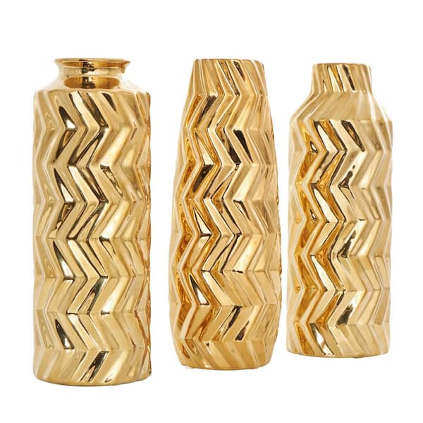 Litton Lane Gold Dimensional Chevron Textured Ceramic Decorative Vase with Varying Shapes (Set of 3) 044654