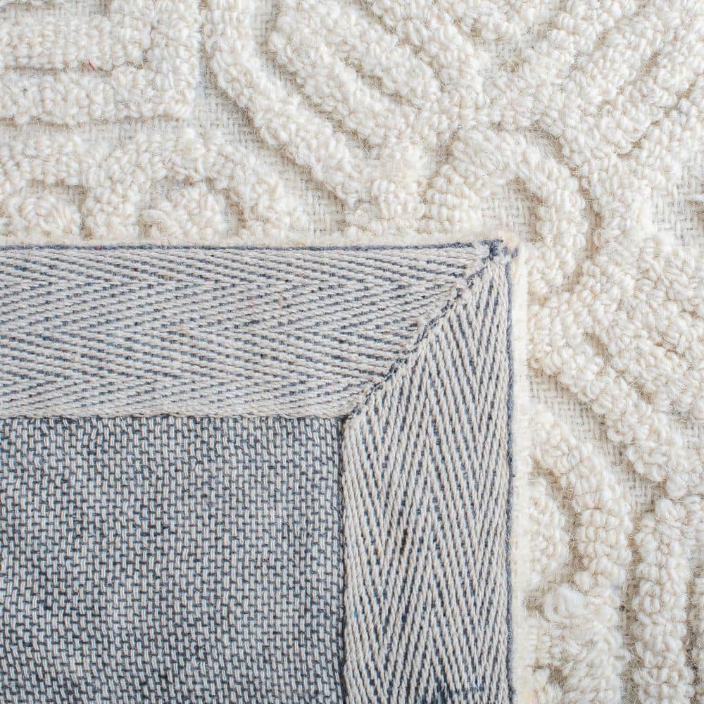 Ivory Hand-Tufted Wool 6' x 9' Rectangular Area Rug