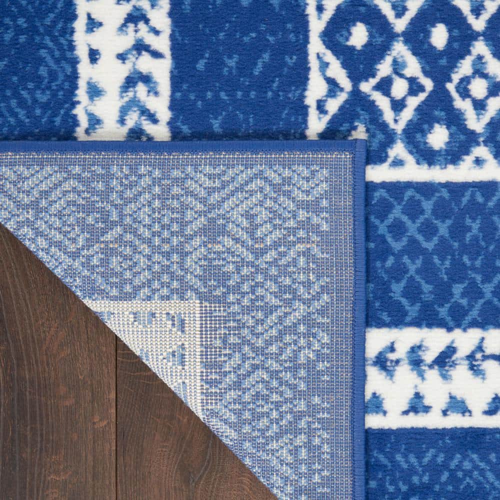 Navy and Ivory Geometric Bohemian 5' x 7' Area Rug