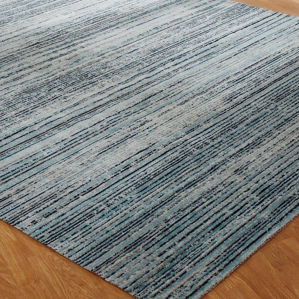 Aqua and Light Gray Abstract Synthetic 2' x 3' Area Rug