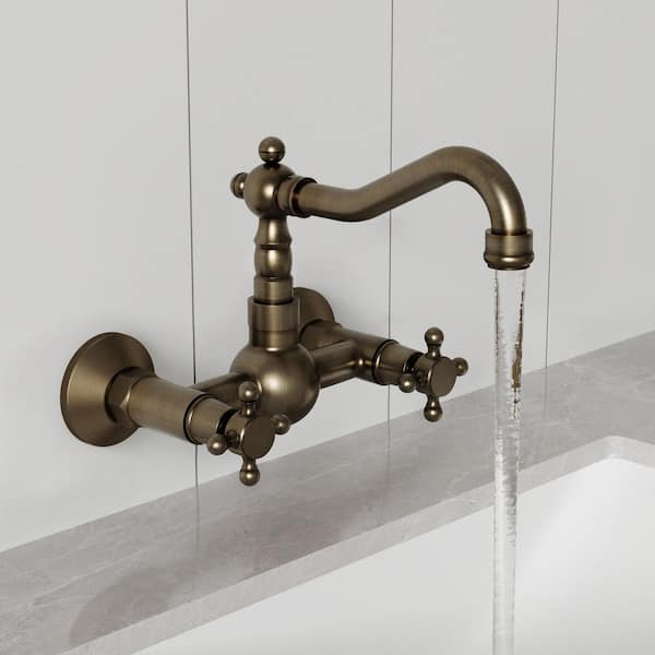 British Vintage Style Waterfall Double Cross Handle Wall Mounted Bathroom Faucet in Antique Brass Drain Not Included