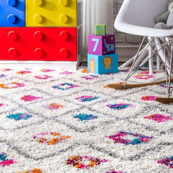https://images.thdstatic.com/productImages/db2aa4d8-2786-430d-80c2-ec35905862c6/svn/pink-multi-nuloom-kids-rugs-ozxl04a-508-31_600.jpg