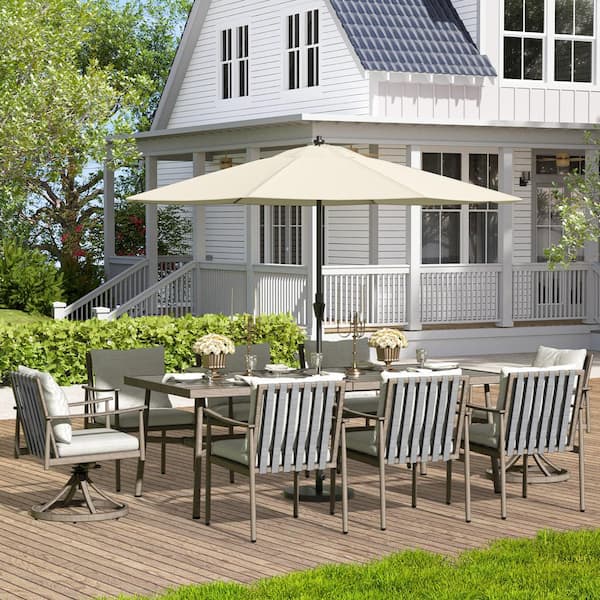 ChillPavilion Sunset Retreat 9-Piece Aluminum Outdoor Dining Set with Swivel Chairs and Light Gray Cushions