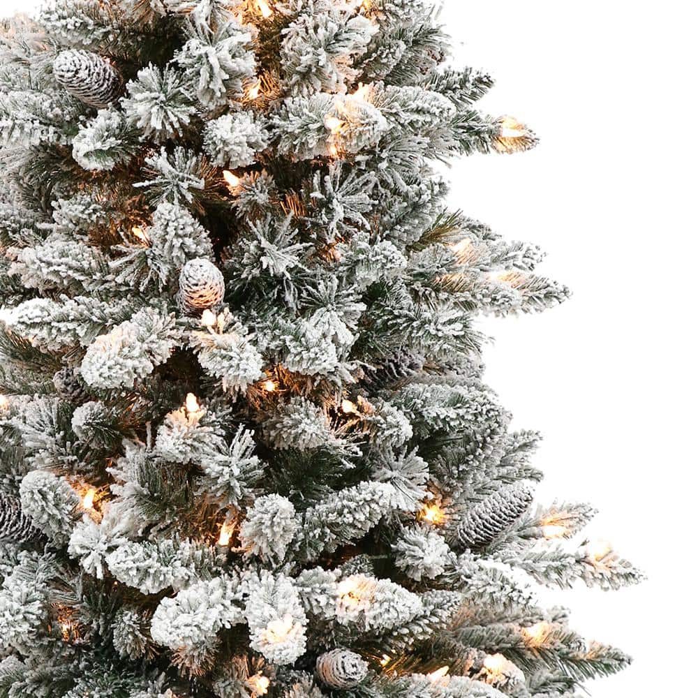 Winter Whisper 4.5' Pre-Lit Flocked Fir Artificial Christmas Tree with Warm White Lights