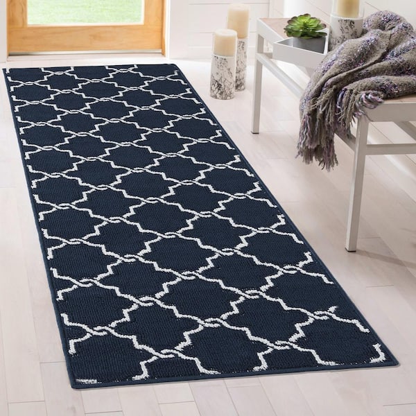 https://images.thdstatic.com/productImages/db480414-985e-4891-a42f-954718f9acc7/svn/navy-and-white-jean-pierre-area-rugs-yma016687-1f_600.jpg
