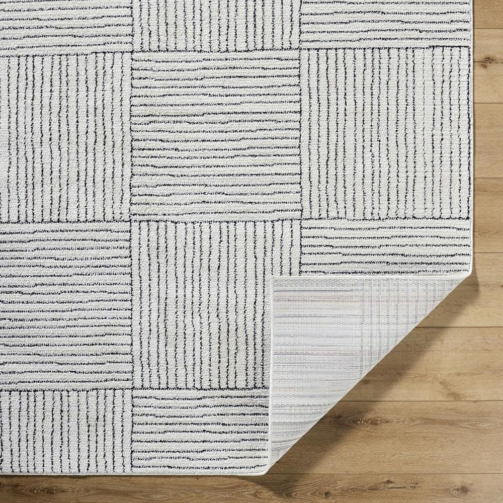 Ivory and Black Rectangular Synthetic Area Rug, 8' x 10'