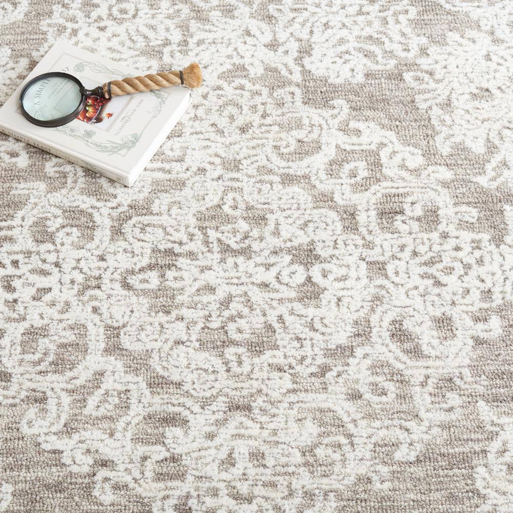 Ivory and Grey 6' x 9' Hand Tufted Wool Area Rug