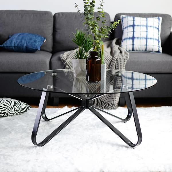 https://images.thdstatic.com/productImages/db60b908-25e3-4c4a-98e3-8327601e72a6/svn/clear-coffee-tables-konya-glass-80cm-a-e1_600.jpg