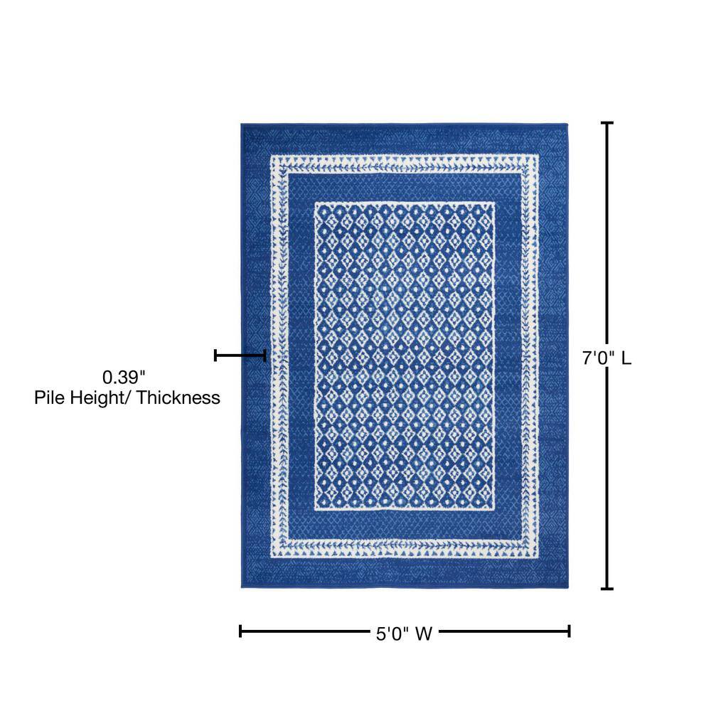 Navy and Ivory Geometric Bohemian 5' x 7' Area Rug