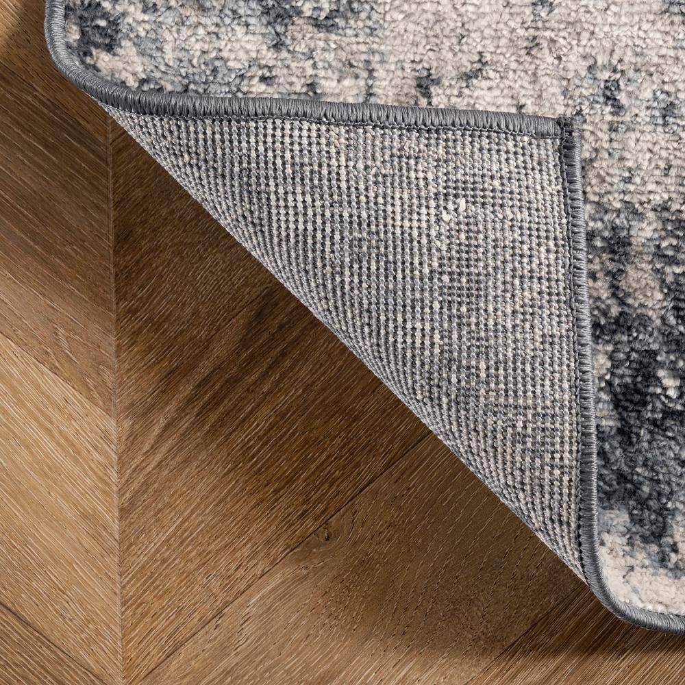 Reversible Abstract Blue Synthetic 4' x 6' Easy-Care Area Rug