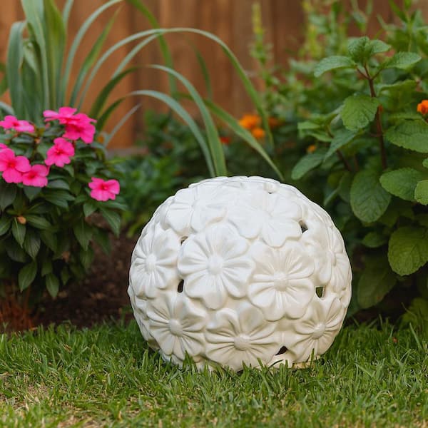 Liv & Skye 10 in. White Stoneware Flower Cut-out Orb Garden Statue