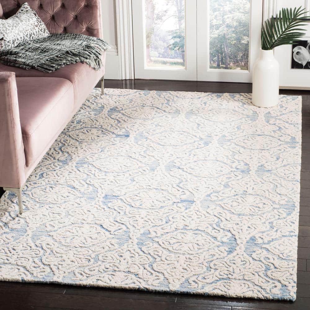 Handmade Blue Ivory Wool Floral 8' x 10' Area Rug