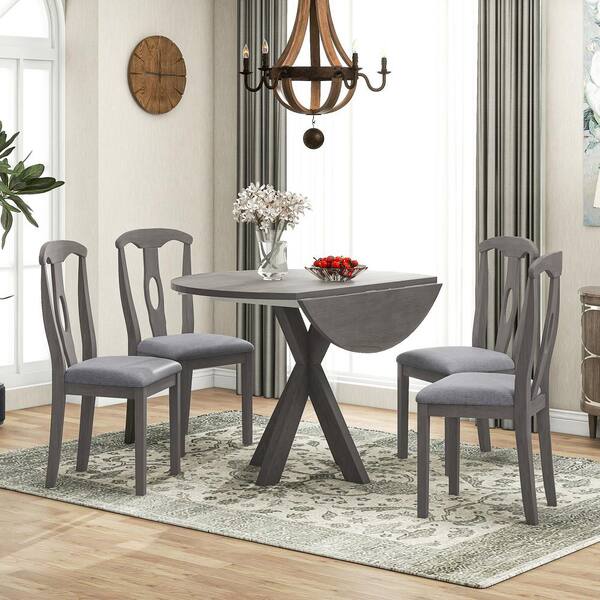 four grey dining chairs