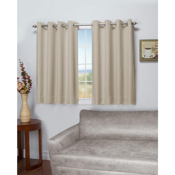 RICARDO Parchment Canvas Solid 50 in. W x 54 in. L Grommet Blackout Curtain