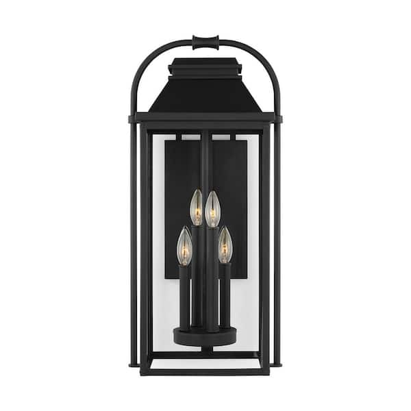 https://images.thdstatic.com/productImages/db9b8893-b959-440d-b8af-4c1641004822/svn/textured-black-outdoor-sconces-ol13202txb-64_600.jpg