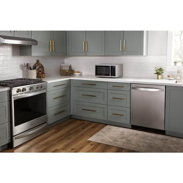 https://images.thdstatic.com/productImages/dbb24cca-b71f-473b-9047-e8dd2d1eb7a8/svn/heritage-stainless-steel-whirlpool-countertop-microwaves-wmc30309ls-31_600.jpg