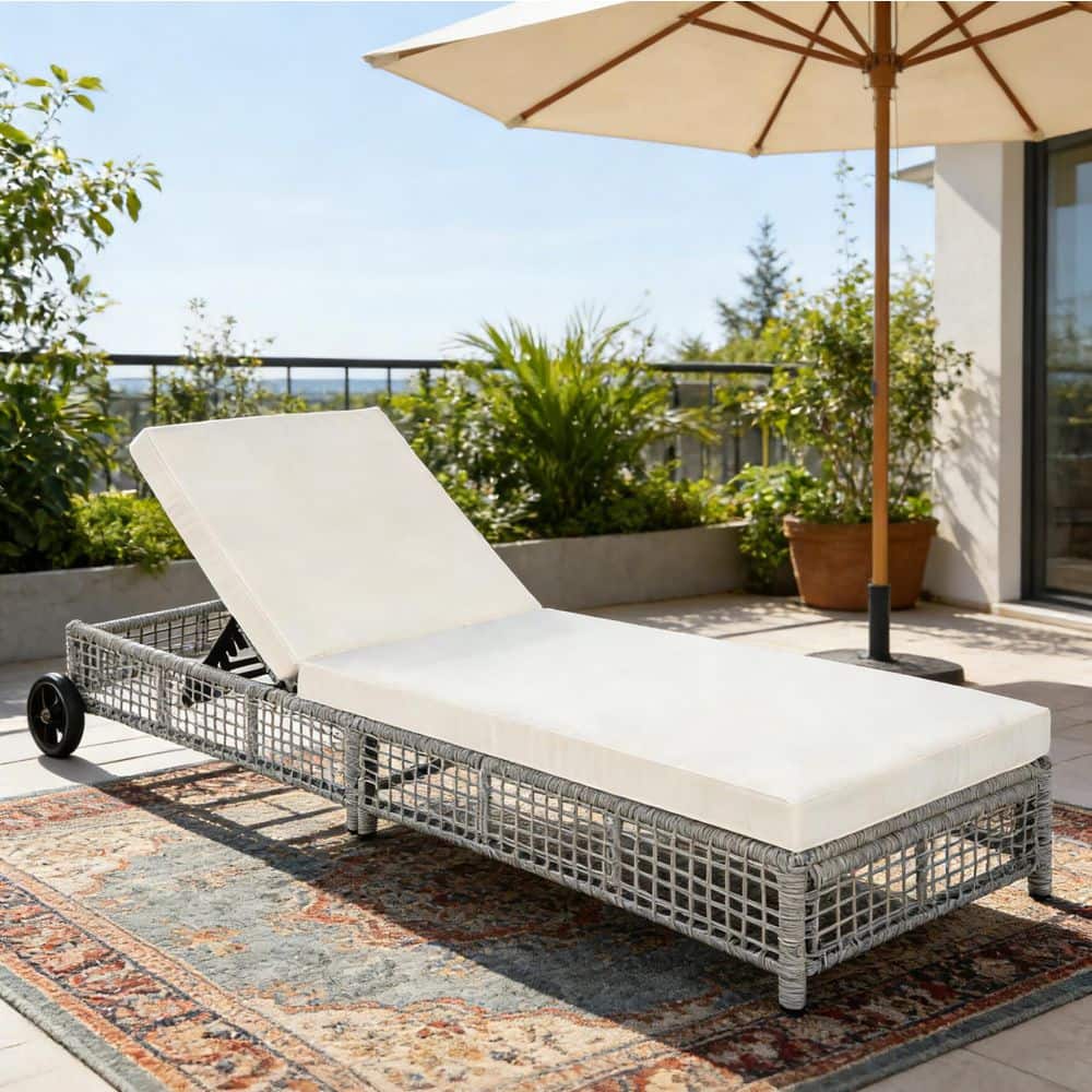 Gray Wicker Outdoor Lounge Chair with Beige Cushions and