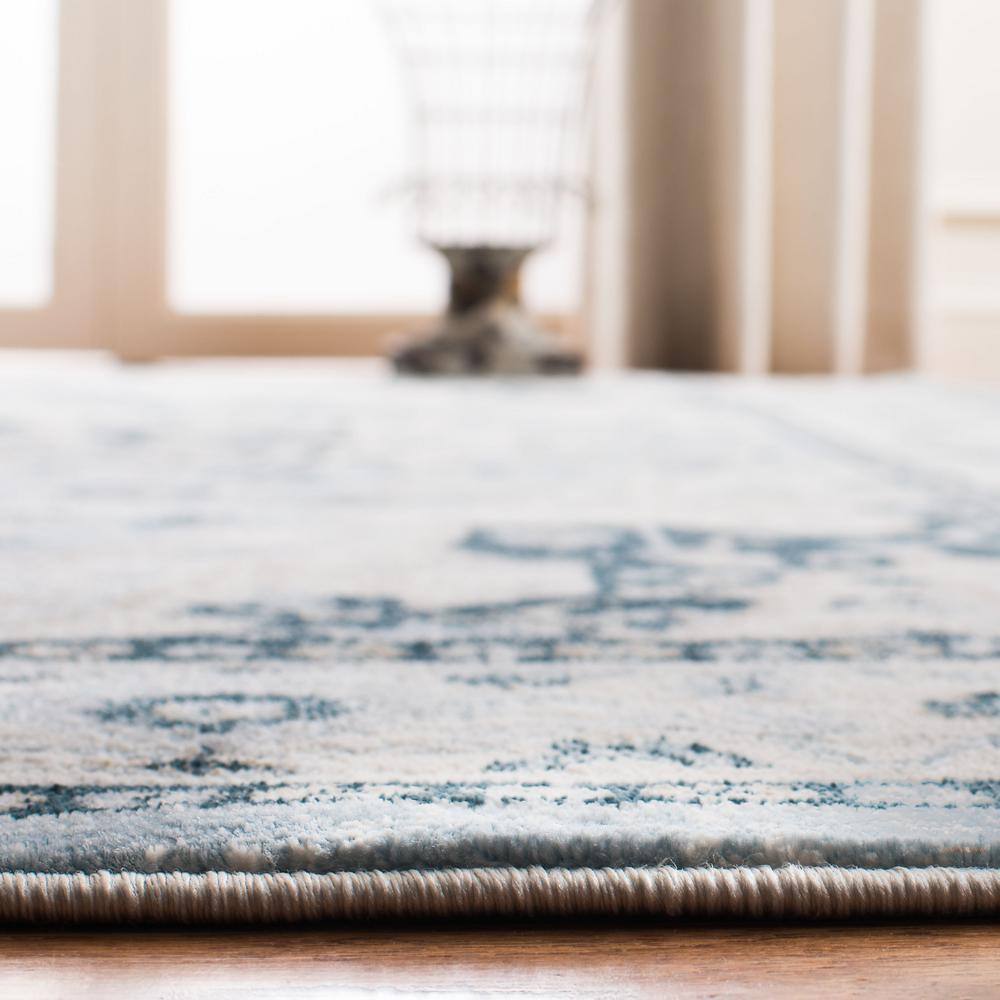 Isabella Light Blue and Cream 8' x 10' Synthetic Area Rug