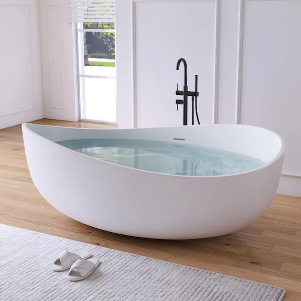 71 in. x 43 in. Wave Stone Resin Solid Surface Flatbottom Freestanding Soaking Bathtub in White