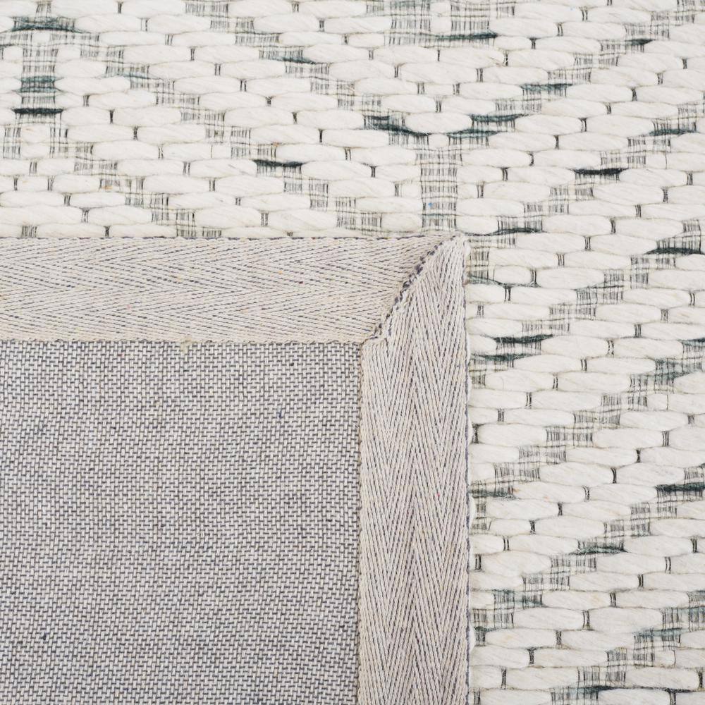 Ivory and Green Handwoven Wool 6' x 9' Area Rug