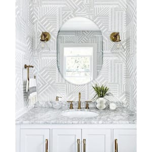 24 in. W x 32 in. H Frameless Oval Beveled Edge Bathroom Vanity Mirror in Silver