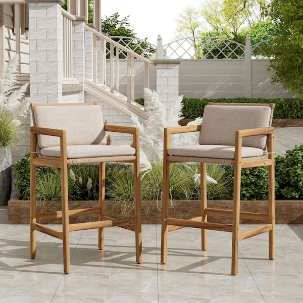 Louis Patio Teak Finish Acacia Wood and Light Brown Wicker Outdoor Bar Stool with Beige Cushion, Arms, Footrest (2-Pack)