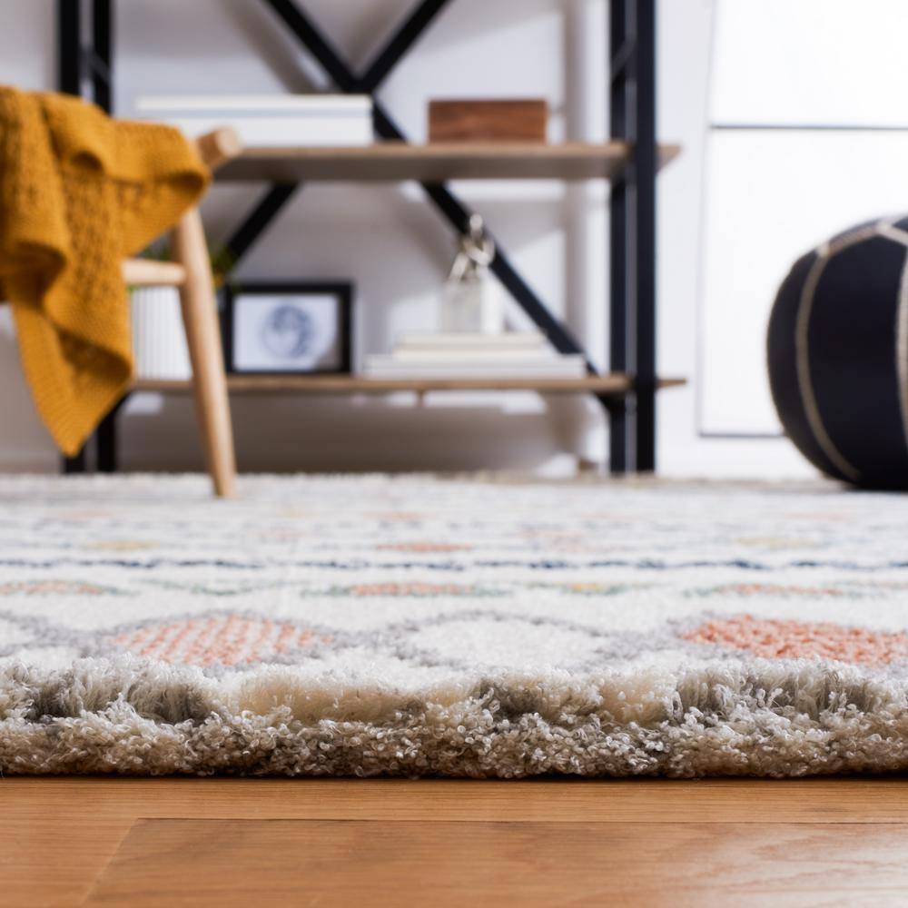 Ivory and Multicolor Geometric Wool and Synthetic 4' x 6' Area Rug