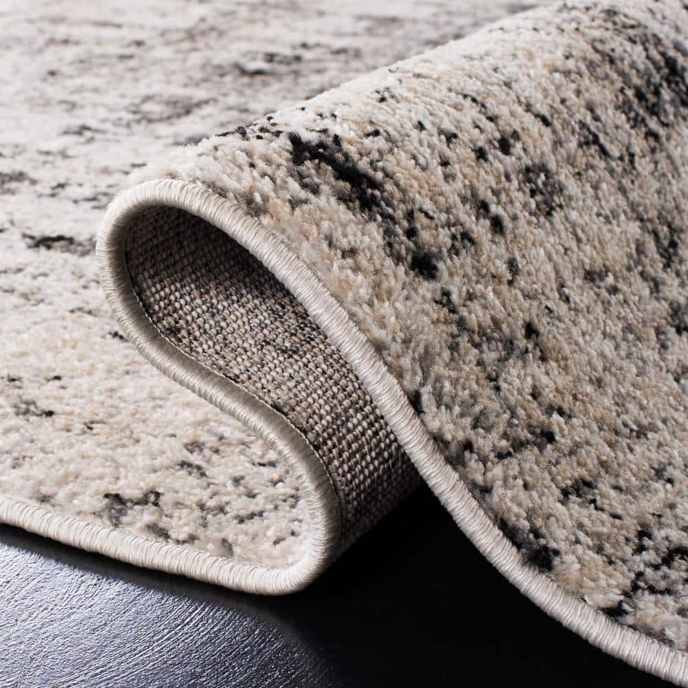 Silver/Black 9' x 12' Abstract Synthetic Rectangular Area Rug