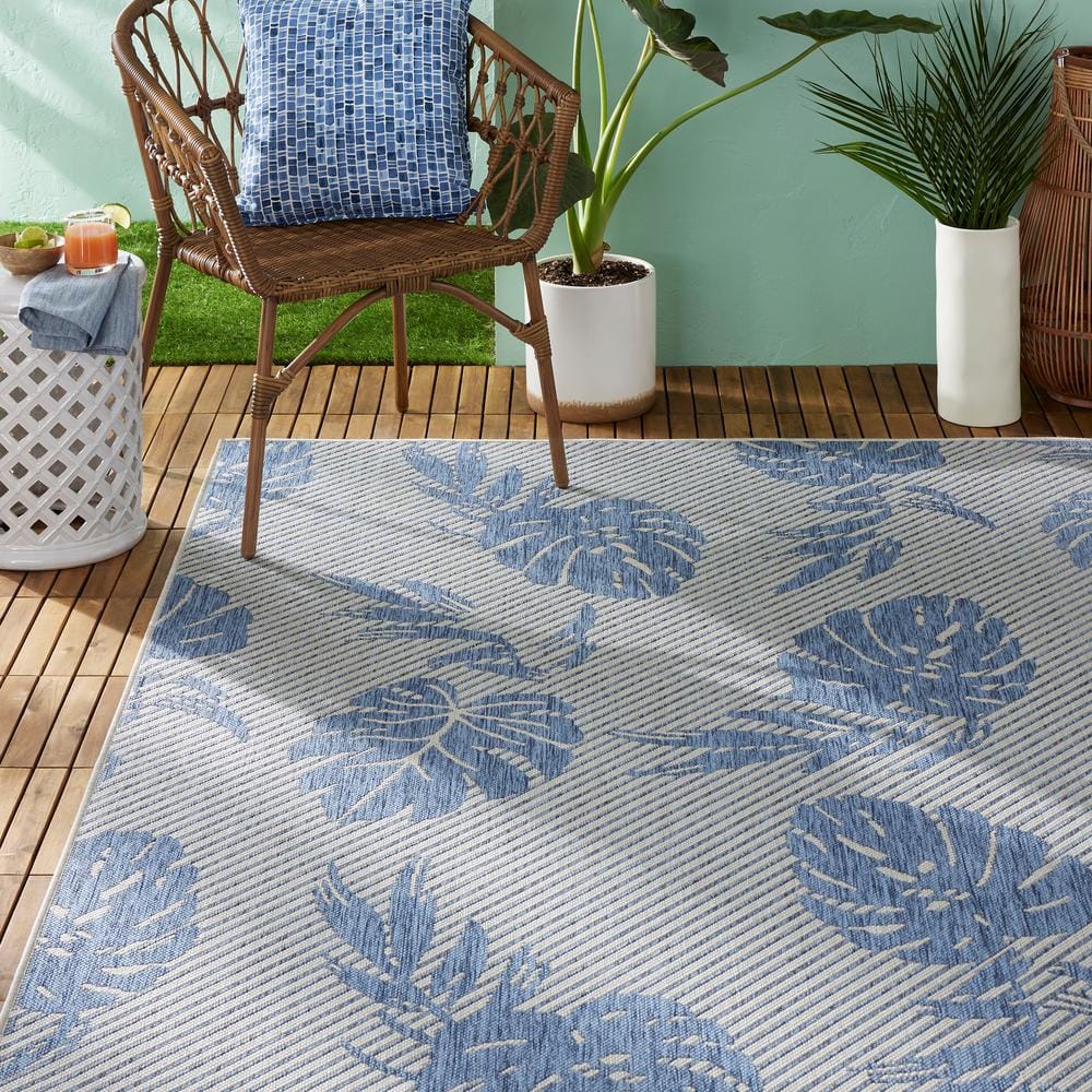 Palm Leaf Blue and Silver Synthetic Indoor/Outdoor Area Rug