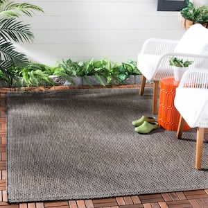 Courtyard Black/Beige Doormat 2 ft. x 4 ft. Solid Indoor/Outdoor Patio Area Rug