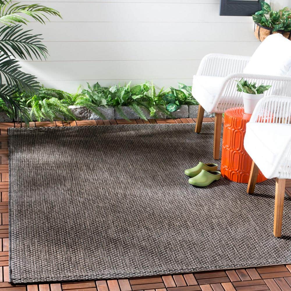 Black and Beige Rectangular Synthetic Outdoor Rug