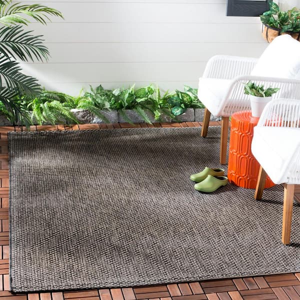 Courtyard Black/Beige 7 ft. x 10 ft. Solid Indoor/Outdoor Patio  Area Rug